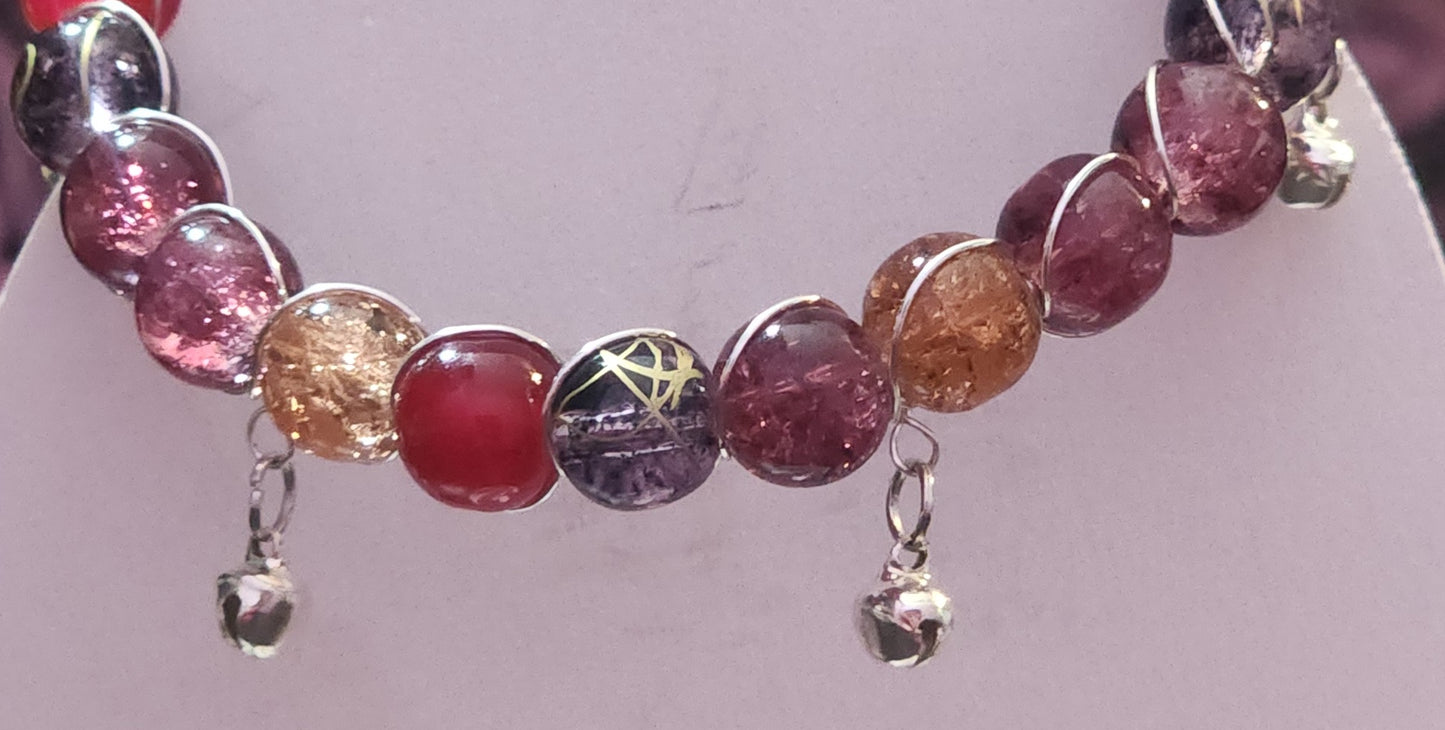 Wire-wrapped jingle bracelet Bead From The Heart Creations