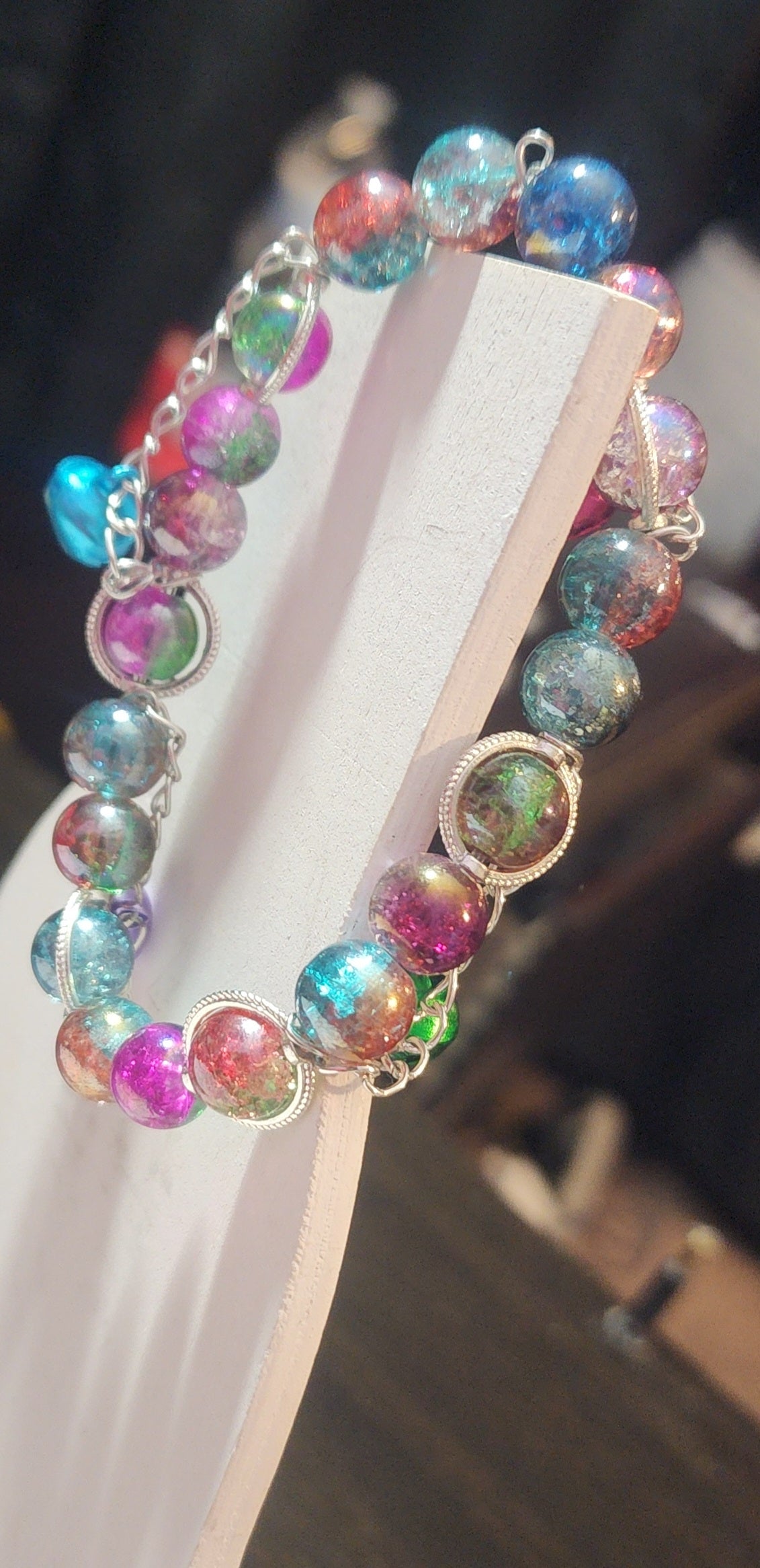 Silver Chained Rainbow Stretch Bracelet with Bells Bead From The Heart Creations